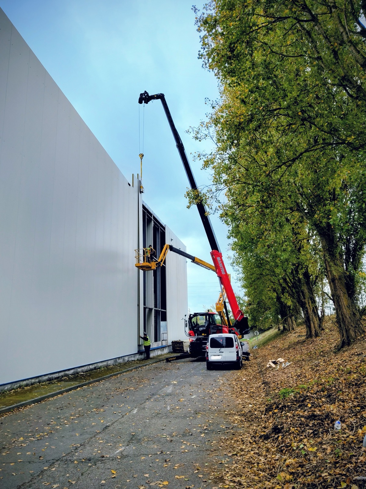 Palonnier à ventouses posant panneau en hauteur avec télescopique — MTLOC Levage